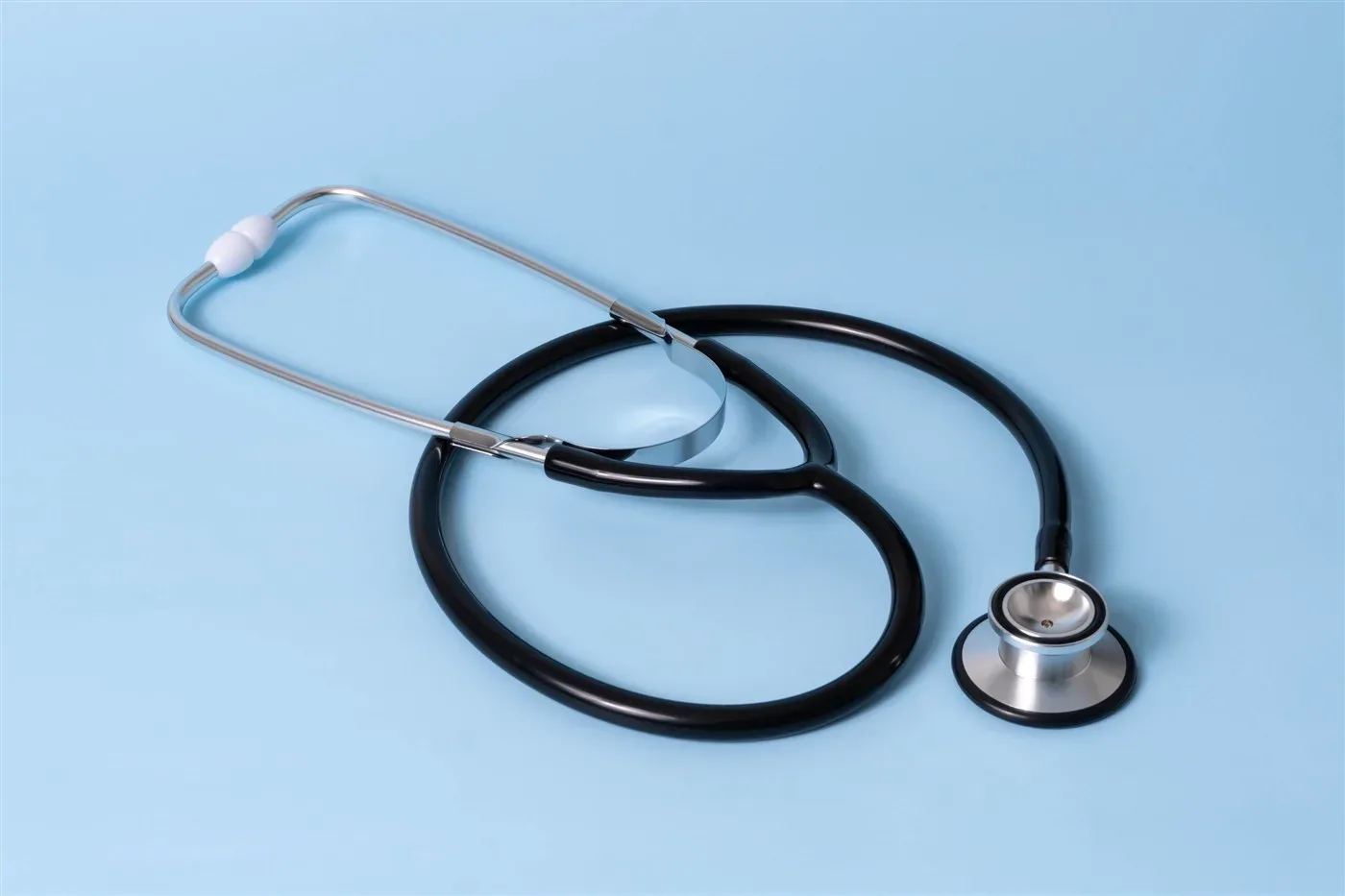 What should people with heart disease who have a stent know before a dental visit?