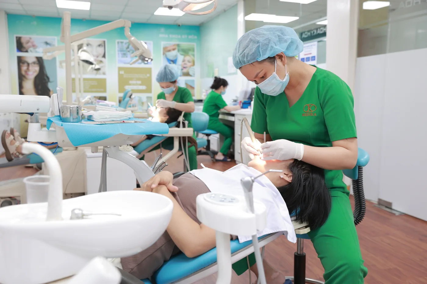 Dentist treating a patient at Ky Hoa Dental